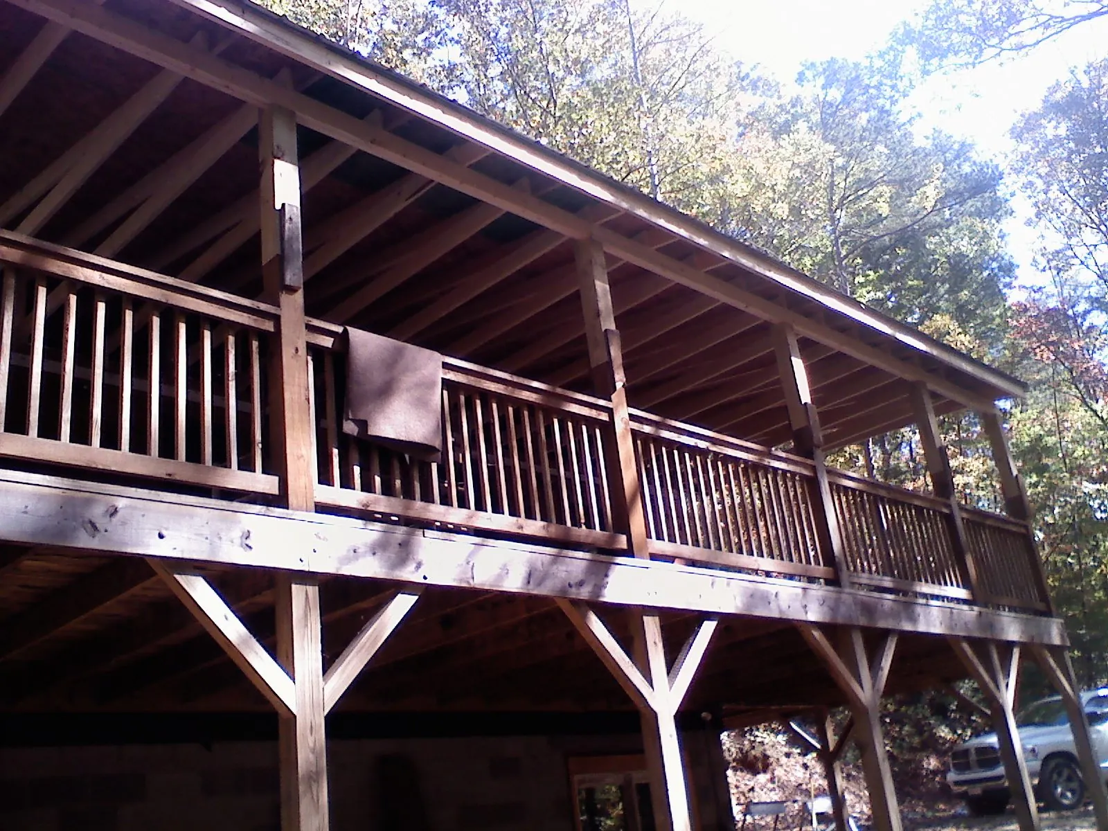 Timber framing under a new elevated porch and deck — Roof Leak Repair in Hicksville by Roofing Brothers